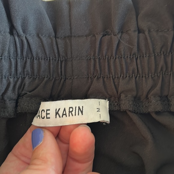 Paper bag waste, cropped black pants - Picture 5 of 6